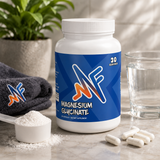 Mindful Magnesium Glycinate supplement in a clean wellness setup with capsules, water, towel, and relaxation elements